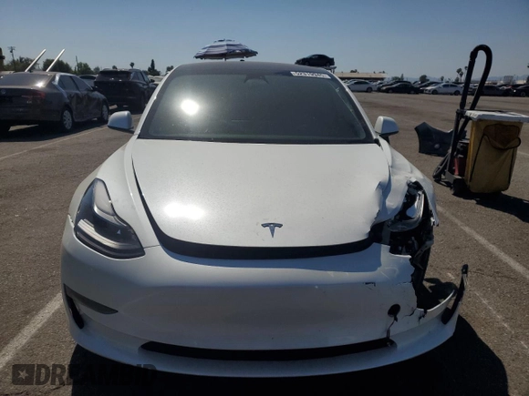 2023 Tesla Model 3 with VIN 5YJ3E1EA8PF394705, listed as a Copart auction lot 52319945 with 58,193 mi miles and Salvage title. Bid and sale history available at DreamBid. Image 5.