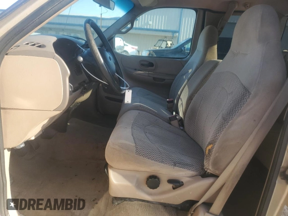 1999 Ford F-150 with VIN 1FTRX17W9XNB77873, listed as a Copart auction lot 52851065 with Not provided miles and Salvage title. Bid and sale history available at DreamBid. Image 7.