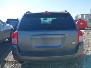 2012 Jeep Compass Latitude with VIN 1C4NJDEBXCD563543, listed as a IAAI auction lot 41711187 with 149,100 mi miles. Bid and sale history available at carsss.com. Image 16.