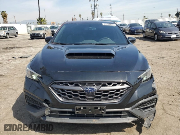 2023 Subaru WRX with VIN JF1VBAA61P9807986, listed as a Copart auction lot 49734655 with 26,908 mi miles and Salvage title. Bid and sale history available at DreamBid. Image 5.