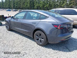 2023 Tesla Model 3 with VIN 5YJ3E1EA6PF664045, listed as a IAAI auction lot 42561039 with 18,708 mi miles and . Bid and sale history available at DreamBid. Image 3.
