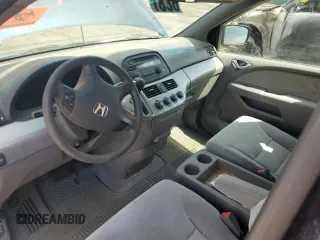 2009 Honda Odyssey LX z VIN 5FNRL38209B051664, wystawiony jako Copart lot #56710125 z przebiegiem 123 mil mil oraz Nie do naprawy • Non repairable. Historia ofert i sprzedaży dostępna na DreamBid. Obrazek 8.