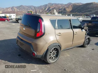 2014 Kia Soul with VIN KNDJN2A24E7064333, listed as a IAAI auction lot 40606019 with 1 mi miles. Bid and sale history available at carsss.com. Image 4.