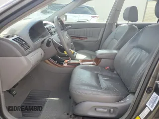 2003 Toyota Camry LE with VIN 4T1BE30K43U724778, listed as a Copart auction lot 53515605 with 176,568 mi miles and Salvage Title. Bid and sale history available at DreamBid. Image 7.