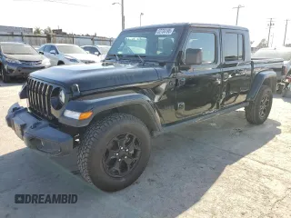 2021 Jeep Gladiator Willys with VIN 1C6HJTAG8ML563161, listed as a Copart auction lot 52734195 with 48,521 mi miles and Salvage Title. Bid and sale history available at carsss.com. Image 1.