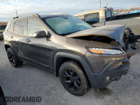 2016 Jeep Cherokee Trailhawk with VIN 1C4PJMBS7GW288639, listed as a Copart auction lot 84059884 with 76,169 mi miles and Non repairable. Bid and sale history available at DreamBid. Image 4.