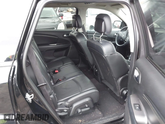 2015 Dodge Journey Crossroad with VIN 3C4PDCGG9FT556973, listed as a IAAI auction lot 41725543 with 123,677 mi miles and . Bid and sale history available at DreamBid. Image 7.