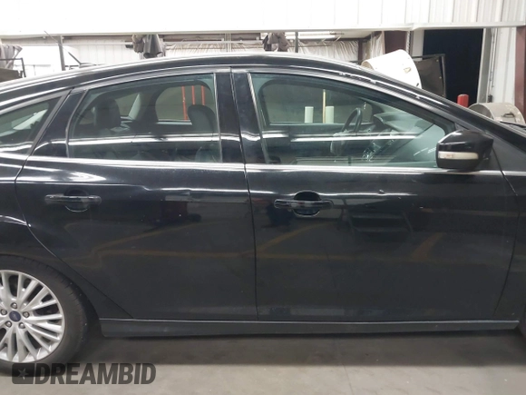 2017 Ford Focus Titanium with VIN 1FADP3N24HL272396, listed as a IAAI auction lot 41852208 with 92,945 mi miles and . Bid and sale history available at carsss.com. Image 14.
