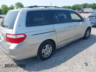2005 Honda Odyssey EX-L z VIN 5FNRL38785B036142, wystawiony jako IAAI lot #42422595 z przebiegiem 190 083 mil mil oraz . Historia ofert i sprzedaży dostępna na DreamBid. Obrazek 4.
