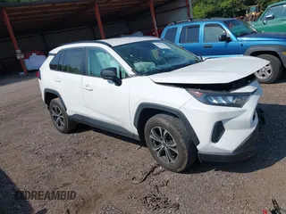 2020 Toyota RAV4 LE with VIN 2T3H1RFV1LC062449, listed as a IAAI auction lot 40064208 with 92,576 mi miles and . Bid and sale history available at DreamBid. Image 1.