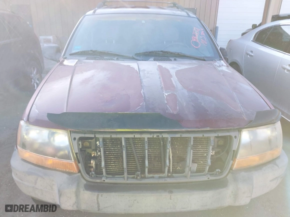 2001 Jeep Grand Cherokee Laredo with VIN 1J4GW48S11C578001, listed as a IAAI auction lot 41671318 with 263,694 mi miles. Bid and sale history available at carsss.com. Image 6.