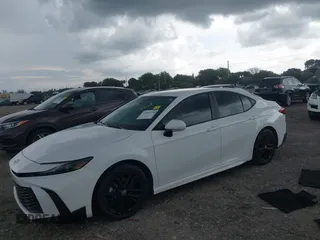 2025 Toyota Camry LE with VIN 4T1DAACK6SU531129, listed as a IAAI auction lot 41969220 with 10,542 mi miles and . Bid and sale history available at DreamBid. Image 2.