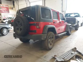 2017 Jeep Wrangler Unlimited Sport with VIN 1C4BJWDG0HL597113, listed as a IAAI auction lot 41764073 with 96,531 mi miles. Bid and sale history available at carsss.com. Image 4.