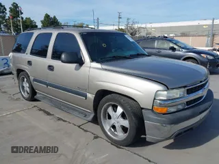 2001 Chevrolet Tahoe LS with VIN 1GNEK13T51J203013, listed as a IAAI auction lot 41886371 with 218,779 mi miles. Bid and sale history available at carsss.com. Image 1.