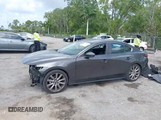 2020 Mazda 3 Select z VIN 3MZBPACL9LM127098, wystawiony jako IAAI lot #41948541 z przebiegiem 67 431 mil mil oraz . Historia ofert i sprzedaży dostępna na DreamBid. Obrazek 2.