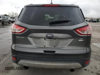 2016 Ford Escape SE with VIN 1FMCU9G97GUA48555, listed as a Copart auction lot 49285395 with 106,941 mi miles and Salvage Title. Bid and sale history available at DreamBid. Image 6.