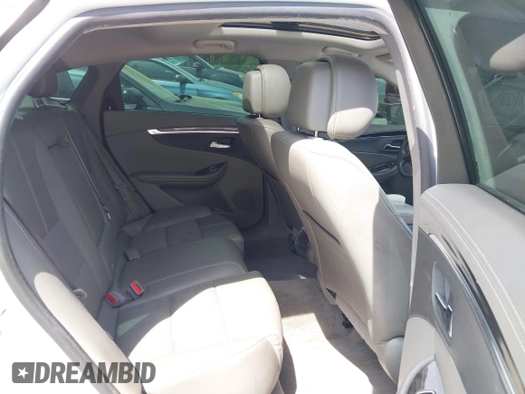 2014 Chevrolet Impala LT with VIN 2G1125S32E9267584, listed as a IAAI auction lot 42079857 with 144,812 mi miles and . Bid and sale history available at DreamBid. Image 8.