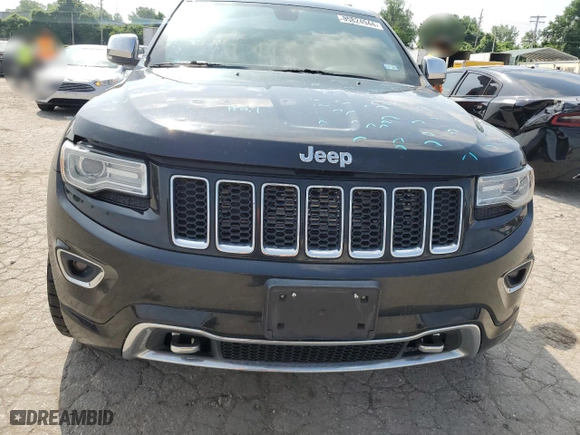 2014 Jeep Grand Cherokee Overland with VIN 1C4RJFCG6EC547604, listed as a Copart auction lot 55824944 with 128,330 mi miles and Clean Title. Bid and sale history available at carsss.com. Image 5.