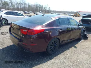 2014 Kia Optima EX with VIN 5XXGN4A70EG266191, listed as a IAAI auction lot 41895612 with 229,472 mi miles and . Bid and sale history available at carsss.com. Image 4.