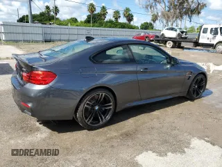 2017 BMW M4 with VIN WBS3R9C59HK709761, listed as a Copart auction lot 64412514 with 53,592 mi miles and Salvage Title. Bid and sale history available at carsss.com. Image 3.