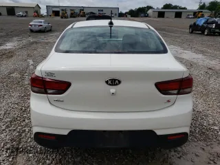 2019 Kia Rio S with VIN 3KPA24AB9KE242236, listed as a Copart auction lot 64750774 with 53,616 mi miles and Salvage Title. Bid and sale history available at carsss.com. Image 6.