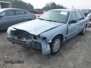 2003 Ford Crown Victoria LX z VIN 2FAFP74W83X180076, wystawiony jako IAAI lot #41744980 z przebiegiem 254 465 mil mil oraz . Historia ofert i sprzedaży dostępna na DreamBid. Obrazek 2.