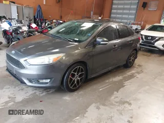 2015 Ford Focus SE with VIN 1FADP3F26FL279667, listed as a IAAI auction lot 42422726 with 102,426 mi miles and . Bid and sale history available at DreamBid. Image 2.