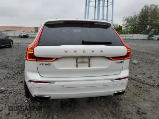 2018 Volvo XC60 Inscription с VIN YV4A22RL8J1061208, выставлен на аукционе Copart как лот 56028255 с пробегом 70 519 миль миль и Списание • Salvage title. История ставок и продаж доступна на DreamBid. Изображение 6.
