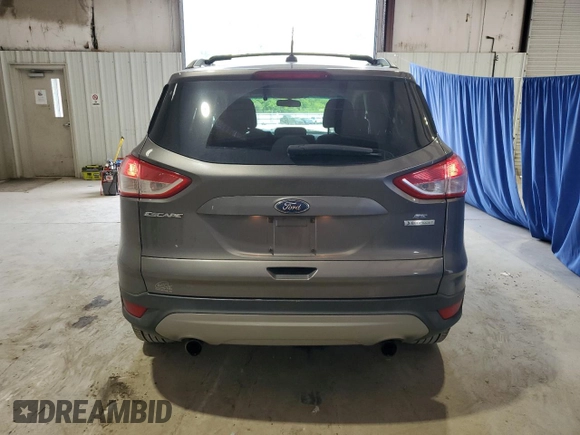 2013 Ford Escape SE with VIN 1FMCU0GX7DUC84970, listed as a Copart auction lot 59611935 with 138,605 mi miles and Salvage title. Bid and sale history available at DreamBid. Image 6.