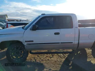 2002 Dodge 2500 with VIN 3B7KF23672M273990, listed as a IAAI auction lot 41354174 with 198,542 mi miles and . Bid and sale history available at DreamBid. Image 14.
