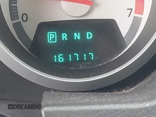 2009 Dodge Grand Caravan SXT with VIN 2D8HN54119R569142, listed as a IAAI auction lot 42000421 with 161,717 mi miles and . Bid and sale history available at DreamBid. Image 12.