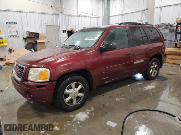 2003 GMC Envoy SLT with VIN 1GKDT13S532241707, listed as a Copart auction lot 86694024 with 185,480 mi miles and Clean Title. Bid and sale history available at carsss.com. Image 1.
