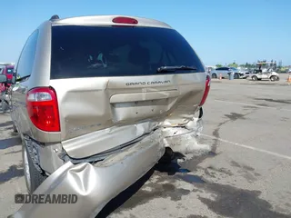 2003 Dodge Caravan Sport with VIN 2D4GP44R73R279132, listed as a IAAI auction lot 42100140 with 218,201 mi miles and . Bid and sale history available at carsss.com. Image 6.