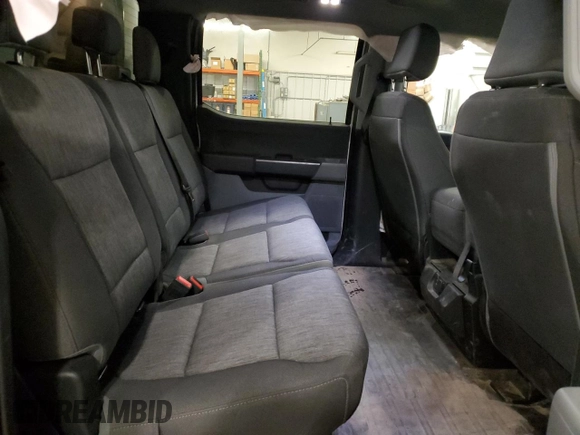 2021 Ford F-150 XL with VIN 1FTFW1E8XMKE65151, listed as a Copart auction lot 52579095 with 77,927 mi miles and Salvage Title. Bid and sale history available at carsss.com. Image 10.