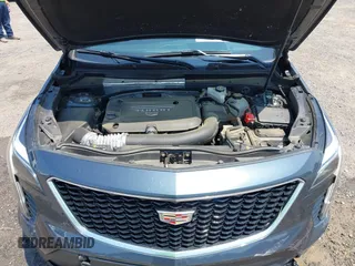 2021 Cadillac XT4 FWD Sport with VIN 1GYFZER41MF079193, listed as a IAAI auction lot 42331594 with 72,287 mi miles and . Bid and sale history available at DreamBid. Image 10.