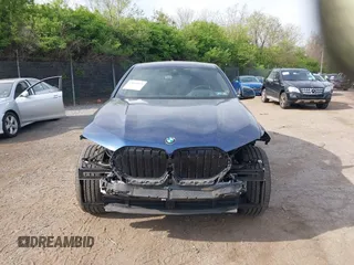 2023 BMW X6 xDrive40i z VIN 5UXCY6C07P9P85707, wystawiony jako IAAI lot #42075043 z przebiegiem 25 218 mil mil oraz . Historia ofert i sprzedaży dostępna na DreamBid. Obrazek 13.
