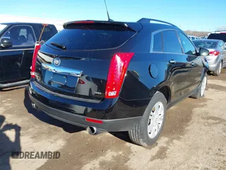 2014 Cadillac SRX with VIN 3GYFNAE32ES550136, listed as a IAAI auction lot 41219755 with 161,878 mi miles and . Bid and sale history available at DreamBid. Image 4.