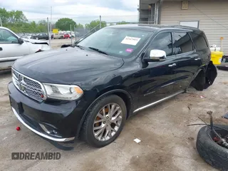 2014 Dodge Durango Citadel with VIN 1C4RDJEGXEC524883, listed as a IAAI auction lot 42357919 with 205,100 mi miles and . Bid and sale history available at DreamBid. Image 2.