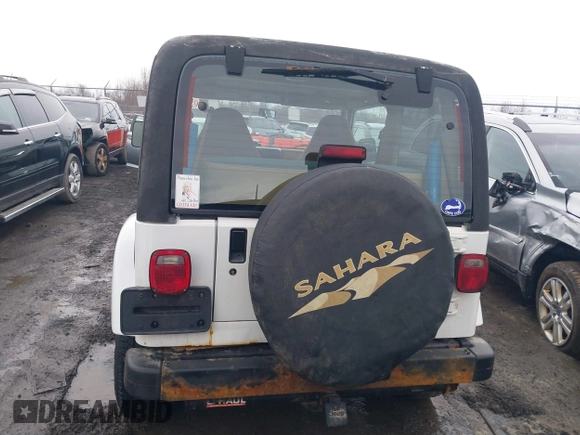 1997 Jeep Wrangler Sahara with VIN 1J4FY49S1VP503639, listed as a IAAI auction lot 41708134 with 102,196 mi miles and . Bid and sale history available at carsss.com. Image 17.