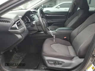 2018 Toyota Camry LE z VIN 4T1B11HK6JU092755, wystawiony jako Copart lot #59233625 z przebiegiem 110 467 mil mil oraz Szkoda całkowita • Salvage title. Historia ofert i sprzedaży dostępna na DreamBid. Obrazek 7.
