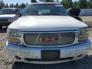 2005 GMC Yukon Denali z VIN 1GKEK63U55J143324, wystawiony jako Copart lot #59000695 z przebiegiem Nie podano mil oraz Szkoda całkowita • Salvage title. Historia ofert i sprzedaży dostępna na DreamBid. Obrazek 5.