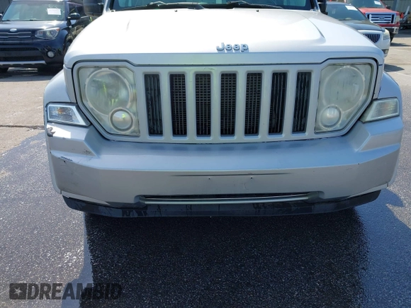 2011 Jeep Liberty Sport Jet with VIN 1J4PN2GK1BW566617, listed as a IAAI auction lot 41789607 with 225,536 mi miles. Bid and sale history available at carsss.com. Image 6.