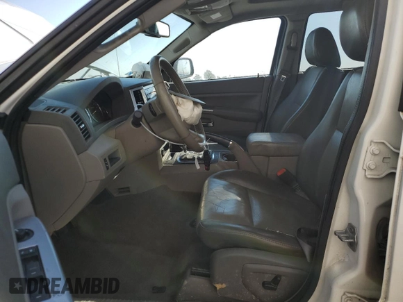2009 Jeep Grand Cherokee Laredo with VIN 1J8HR48P89C532571, listed as a Copart auction lot 57309544 with 203,423 mi miles and Non Repairable. Bid and sale history available at carsss.com. Image 7.