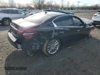 2019 Infiniti Q50 Luxe z VIN JN1EV7AR4KM592160, wystawiony jako Copart lot #52299965 z przebiegiem 99 645 mil mil oraz Czysty tytuł • Clean title. Historia ofert i sprzedaży dostępna na DreamBid. Obrazek 3.