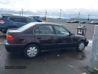 2000 Honda Civic LX with VIN 1HGEJ6676YL036362, listed as a IAAI auction lot 41912249 with 135,112 mi miles. Bid and sale history available at carsss.com. Image 13.