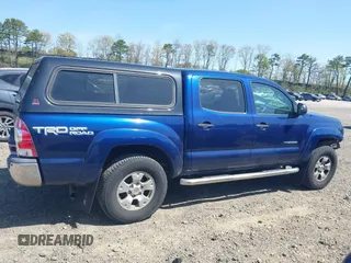 2014 Toyota Tacoma with VIN 3TMLU4EN4EM154261, listed as a IAAI auction lot 42119237 with 211,929 mi miles and . Bid and sale history available at DreamBid. Image 14.