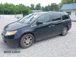 2012 Honda Odyssey EX-L with VIN 5FNRL5H66CB095996, listed as a IAAI auction lot 42446499 with 198,016 mi miles and . Bid and sale history available at DreamBid. Image 2.