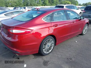 2014 Ford Fusion SE Hybrid with VIN 3FA6P0LU4ER125844, listed as a IAAI auction lot 42490676 with 246,821 mi miles and . Bid and sale history available at DreamBid. Image 4.