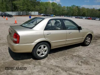 2001 Mazda Protege LX with VIN JM1BJ225810473897, listed as a Copart auction lot 52192045 with 145,839 mi miles and Salvage Title. Bid and sale history available at carsss.com. Image 3.