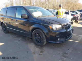 2019 Dodge Grand Caravan GT with VIN 2C4RDGEG8KR670771, listed as a IAAI auction lot 41657630 with 124,897 mi miles. Bid and sale history available at carsss.com. Image 1.